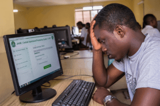Stressed student checking admission status