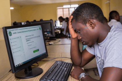 Stressed student checking admission status