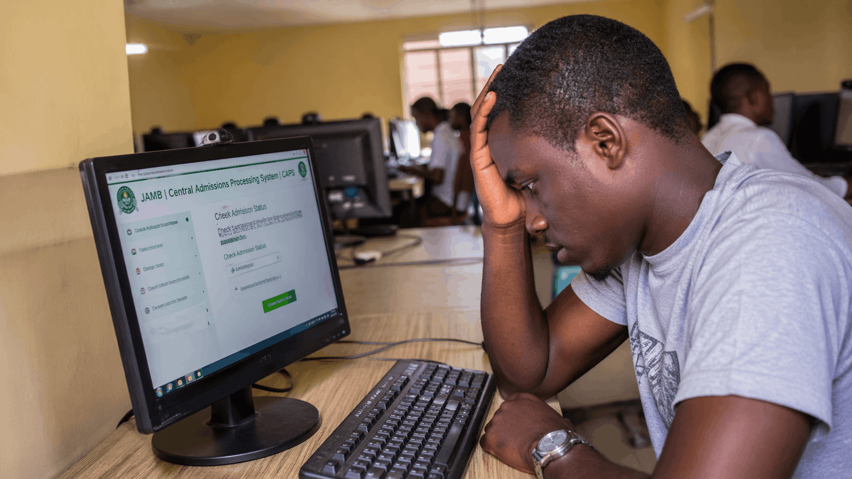 Stressed student checking admission status